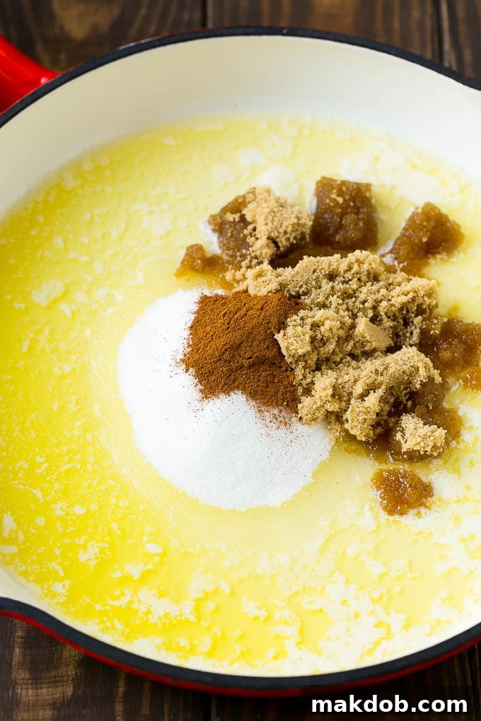 Butter, brown sugar, granulated sugar and cinnamon in a pan.