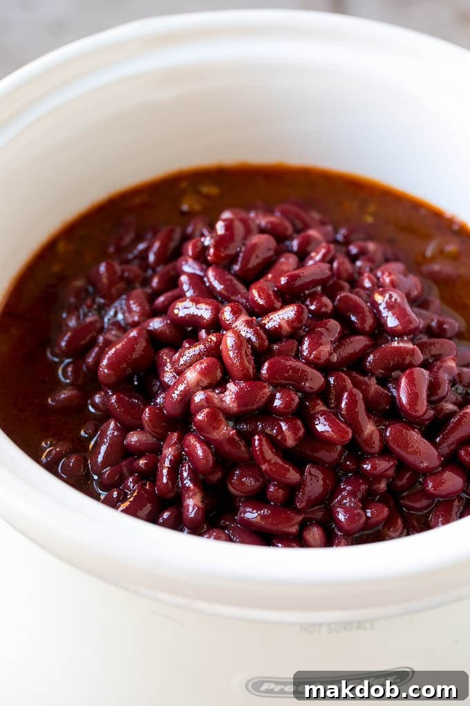 Slow Cooker Chili Recipe | Crock Pot Chili | Beef Chili | Beef and Bean Chili #chili #soup #beef #slowcooker #crockpot #dinner #dinneratthezoo Kidney beans with beef chili in a slow cooker.