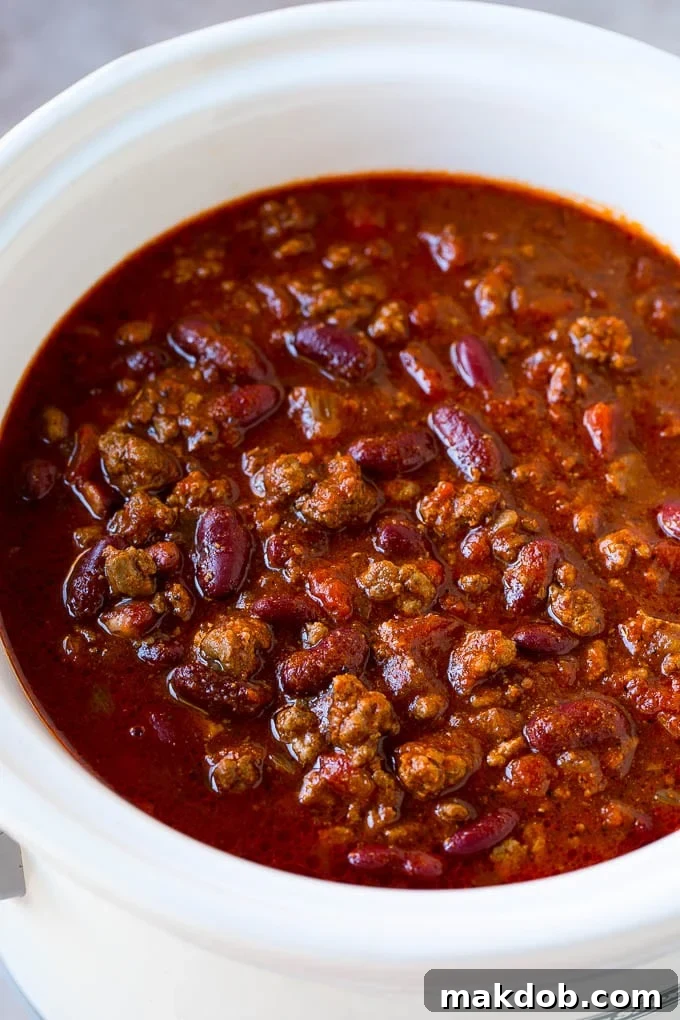Slow Cooker Chili Recipe | Crock Pot Chili | Beef Chili | Beef and Bean Chili #chili #soup #beef #slowcooker #crockpot #dinner #dinneratthezoo Slow cooker chili made with beef, kidney beans and spices.