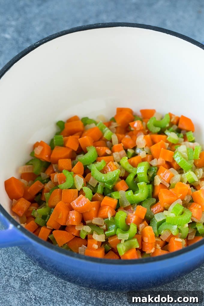 Carrpts, celery, onion and garlic in a soup pot.