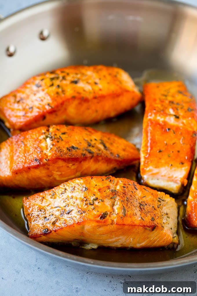 Greek Salmon Salad Recipe | Low Carb Salmon Recipe | Salmon Salad #salmon #seafood #fish #lowcarb #keto #lunch #dinneratthezoo #healthy Seared fish fillets in a skillet.