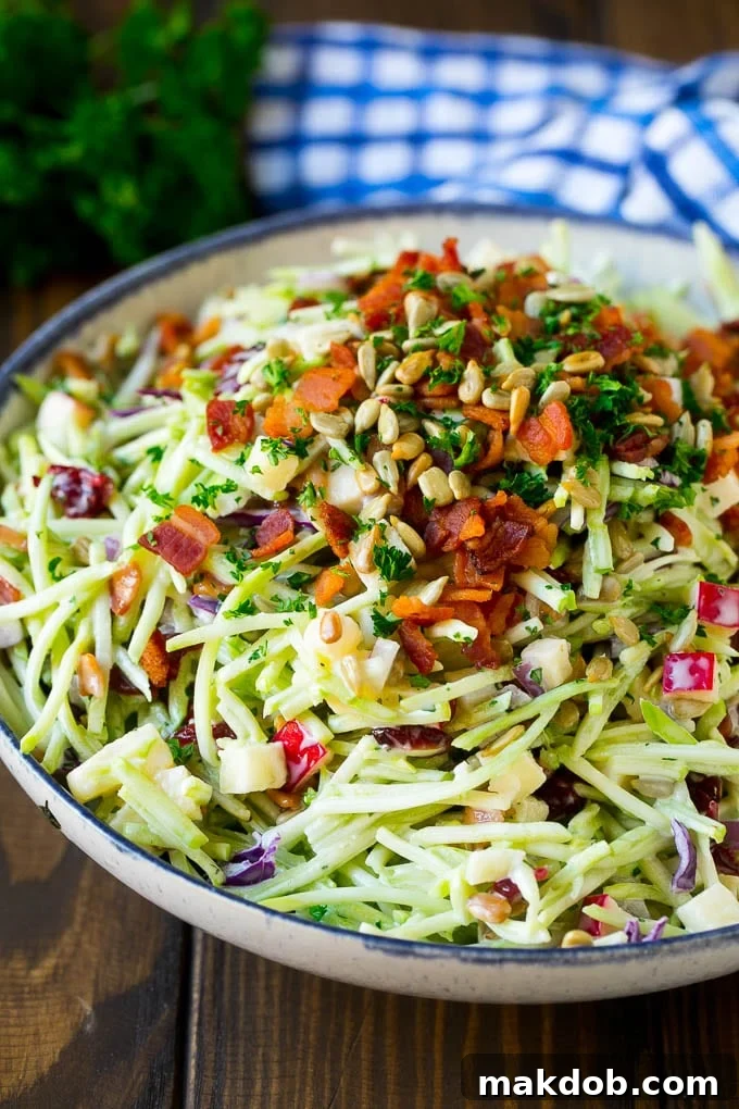 Broccoli slaw with apples, sunflower seeds and bacon, all tossed in a creamy dressing.