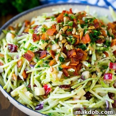 Broccoli slaw with apples, sunflower seeds and bacon, all tossed in a creamy dressing.