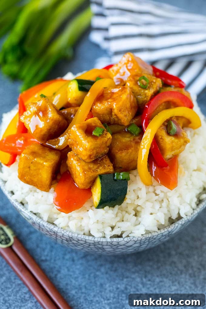 Tofu stir fry served over steamed rice.