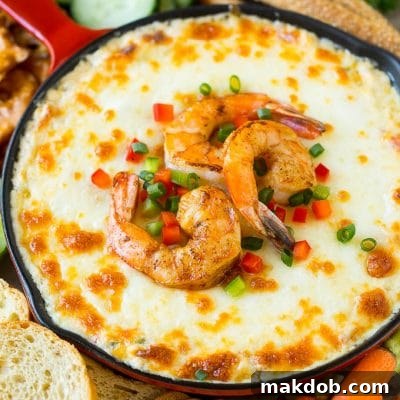 Hot shrimp dip with three types of cheese and Cajun seasoning.