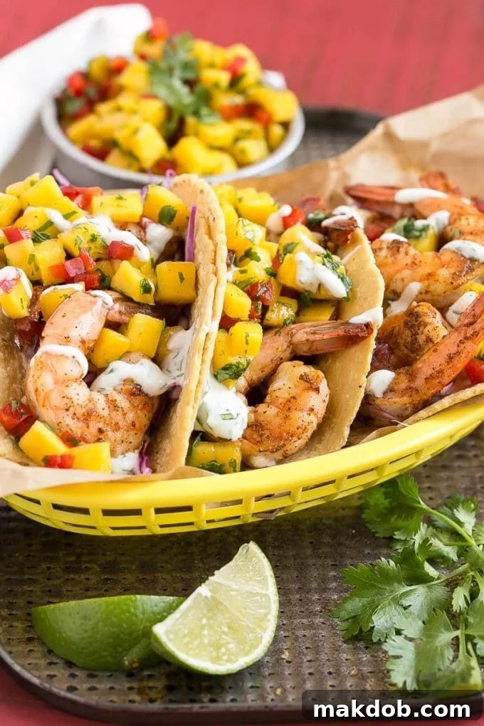 Corn tortillas filed with shrimp, creamy lime sauce and mango salsa.
