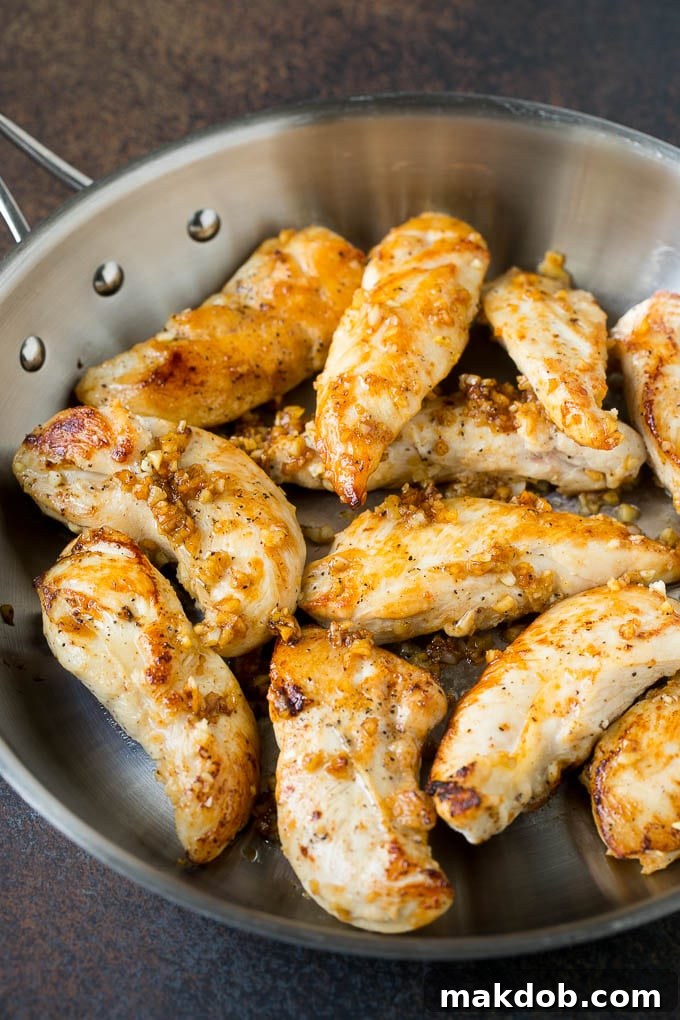 Creamy Garlic Chicken Recipe | Chicken Breast Tenders | Sauteed Chicken #chicken #garlic #parmesan #dinner #glutenfree #keto #lowcarb #dinneratthezoo Chicken sauteed with garlic and butter in a skillet.