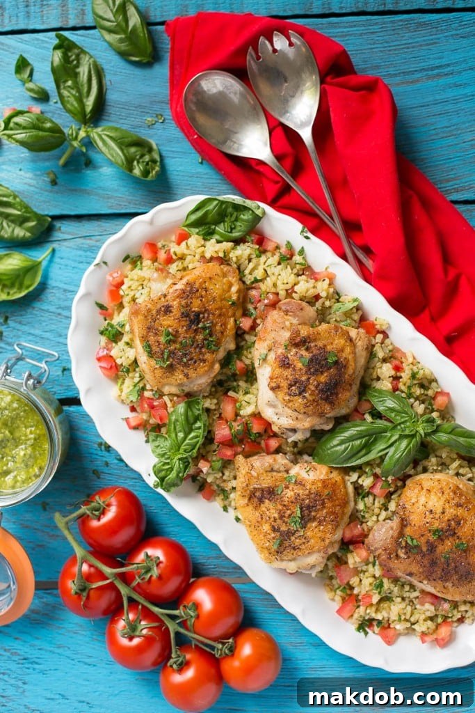 This one pot chicken with tomato basil risotto is the perfect weeknight meal - the whole thing bakes in the oven in a single dish!