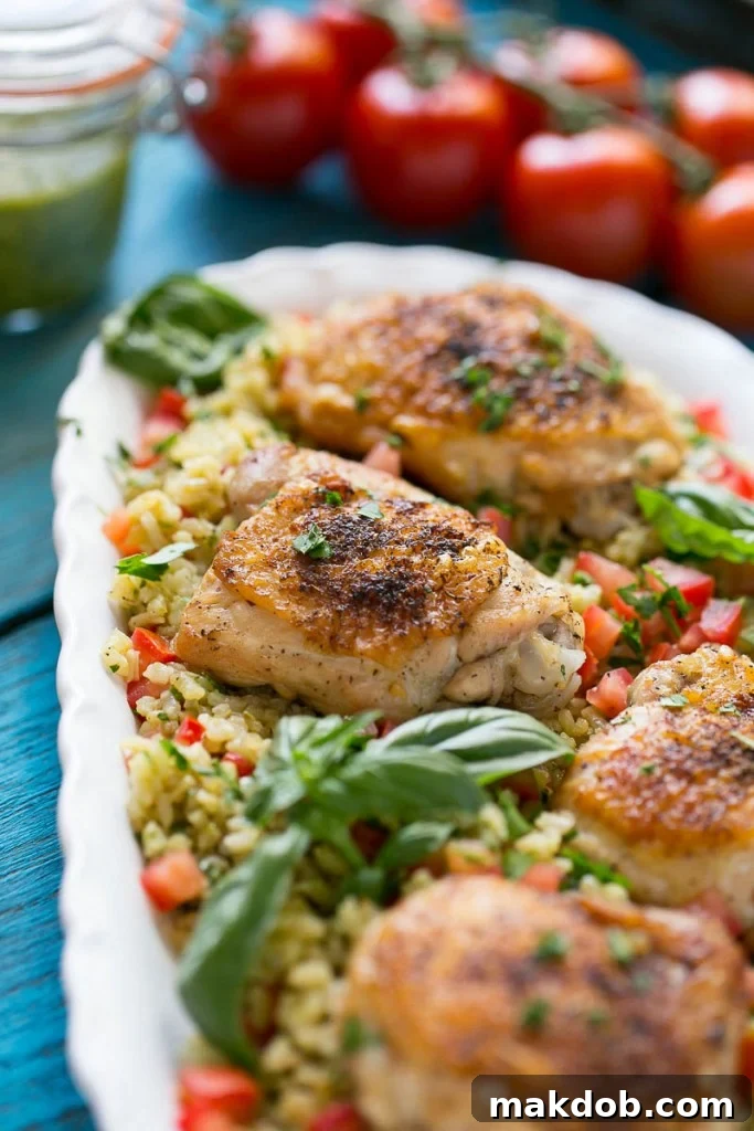 This one pot chicken with tomato basil risotto is the perfect weeknight meal - the whole thing bakes in the oven in a single dish!