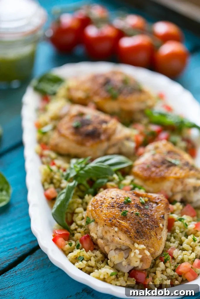 This one pot chicken with tomato basil risotto is the perfect weeknight meal - the whole thing bakes in the oven in a single dish!