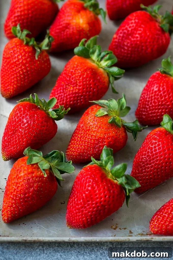 Chocolate Strawberry Indulgence 2 Fresh strawberries on a sheet pan.