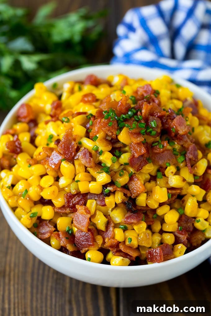 Bacon Fried Corn Recipe | Sauteed Corn | Corn Side Dish #corn #bacon #sidedish #glutenfree #dinner #dinneratthezoo A serving bowl of Southern fried corn with bacon.