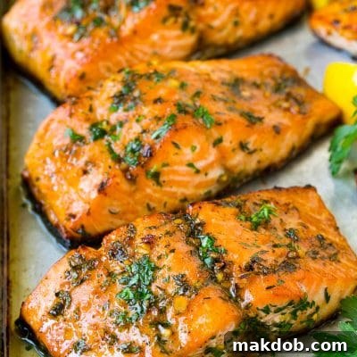 Baked salmon topped with garlic, herbs and butter.