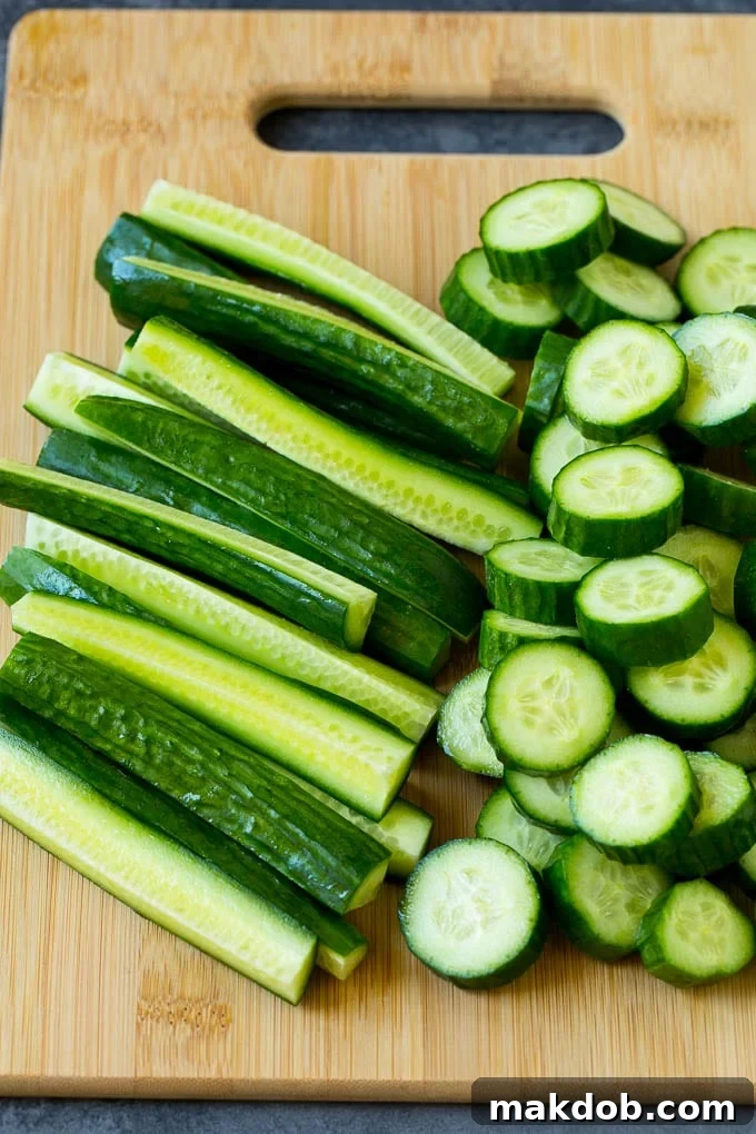 Cucumbers cut into slices and spears.