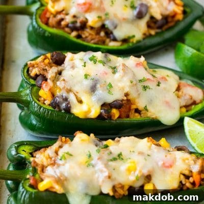 Stuffed poblano peppers filled with rice, corn, beans and meat.