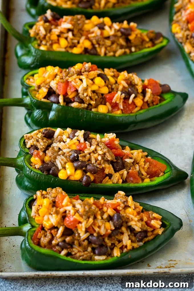 Poblano peppers filled with rice, meat, beans and corn.
