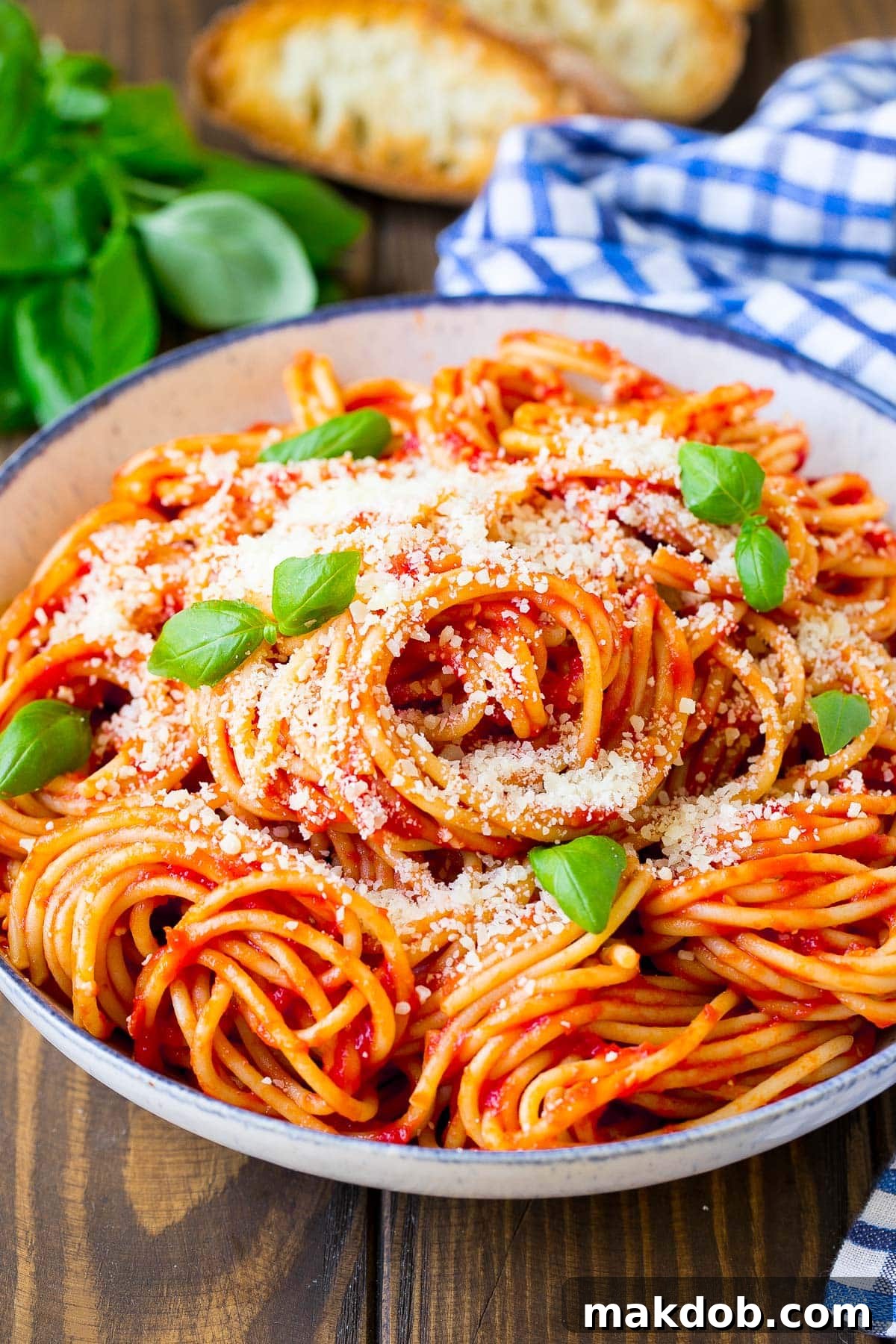 Simply Perfect Pasta Pomodoro 2 A serving bowl of pasta pomodoro garnished with fresh basil.