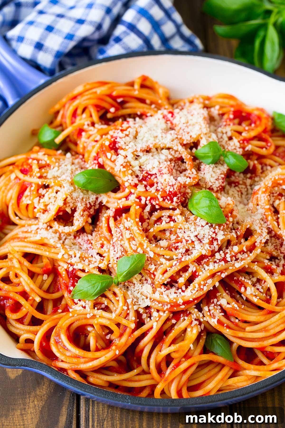 Simply Perfect Pasta Pomodoro 6 A pan of pasta pomodoro topped with cheese and basil.