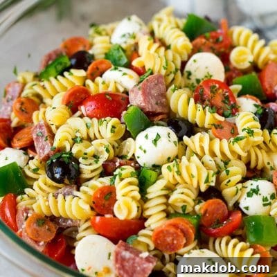 Italian pasta salad with rotini noodles, salami and pepperoni.