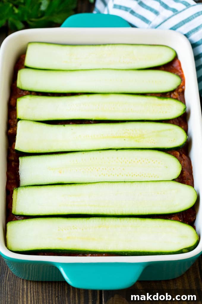 Zucchini Lasagna | Low Carb Lasagna #zucchini #lasagna #lowcarb #groundbeef #dinner #dinneratthezoo Zucchini slices layered with meat sauce and cheese.