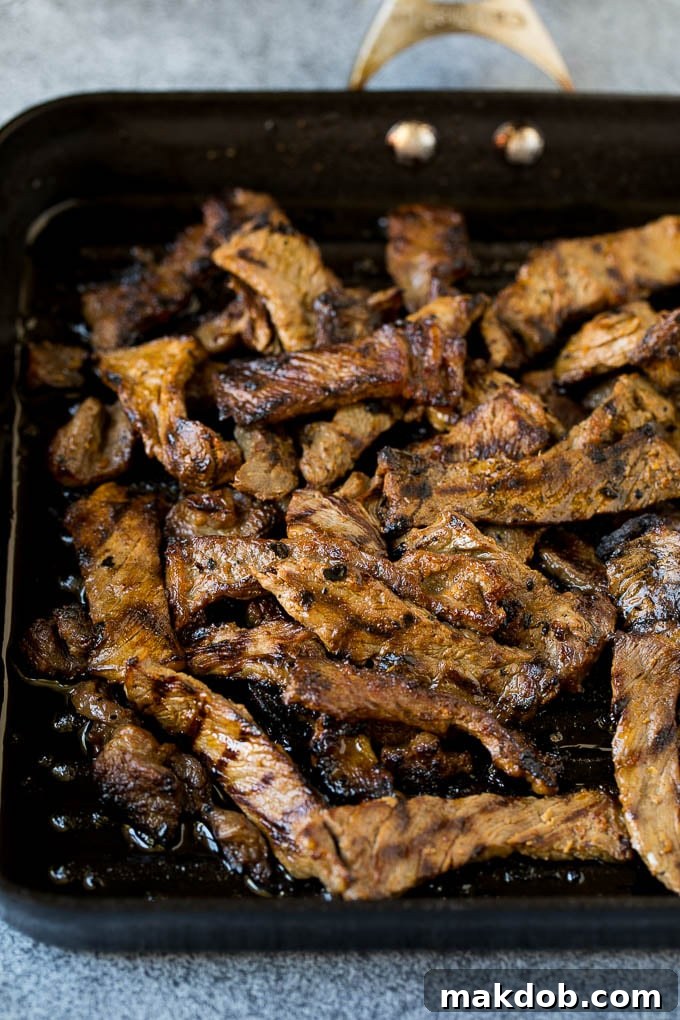 Beef Bulgogi Recipe | Korean BBQ #beef #koreanfood #grilling #steak #dinner #dinneratthezoo Beef strips cooked on a grill pan.
