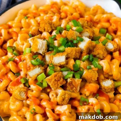 Kickin' Buffalo Mac 2 Buffalo chicken mac and cheese with crispy chicken pieces, celery and hot sauce.