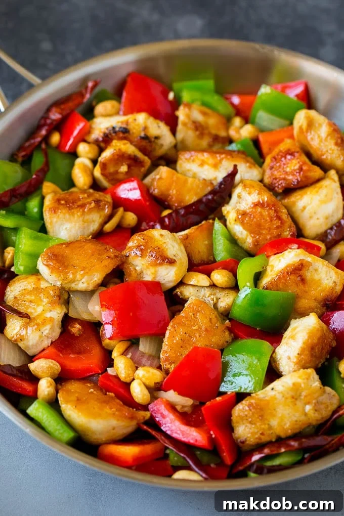 Kung Pao Chicken Recipe | Chicken Stir Fry #chicken #stirfry #chinesefood #peanuts #peppers #dinner #dinneratthezoo Chicken, beanuts, bell peppers and chilies all cooked together in a skillet.