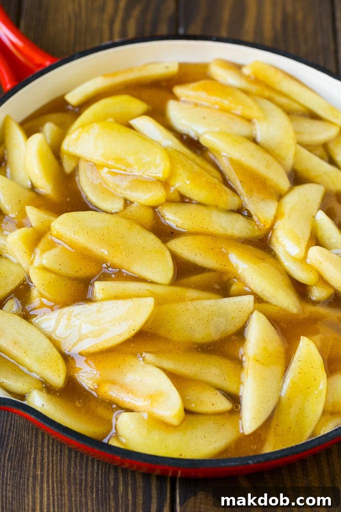 Dutch Apple Pie Recipe | Homemade Apple Pie #pie #apple #dessert #baking #fall #dinneratthezoo Homemade apple pie filling in a skillet.