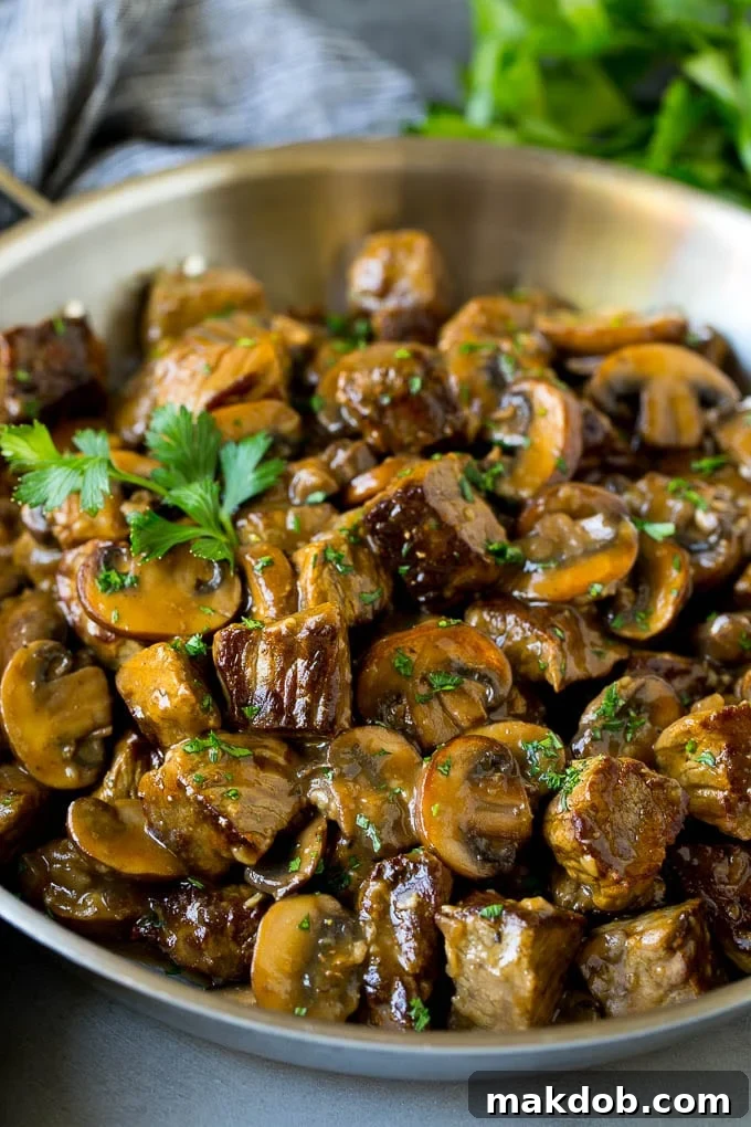 Beef tips with mushrooms in brown gravy.