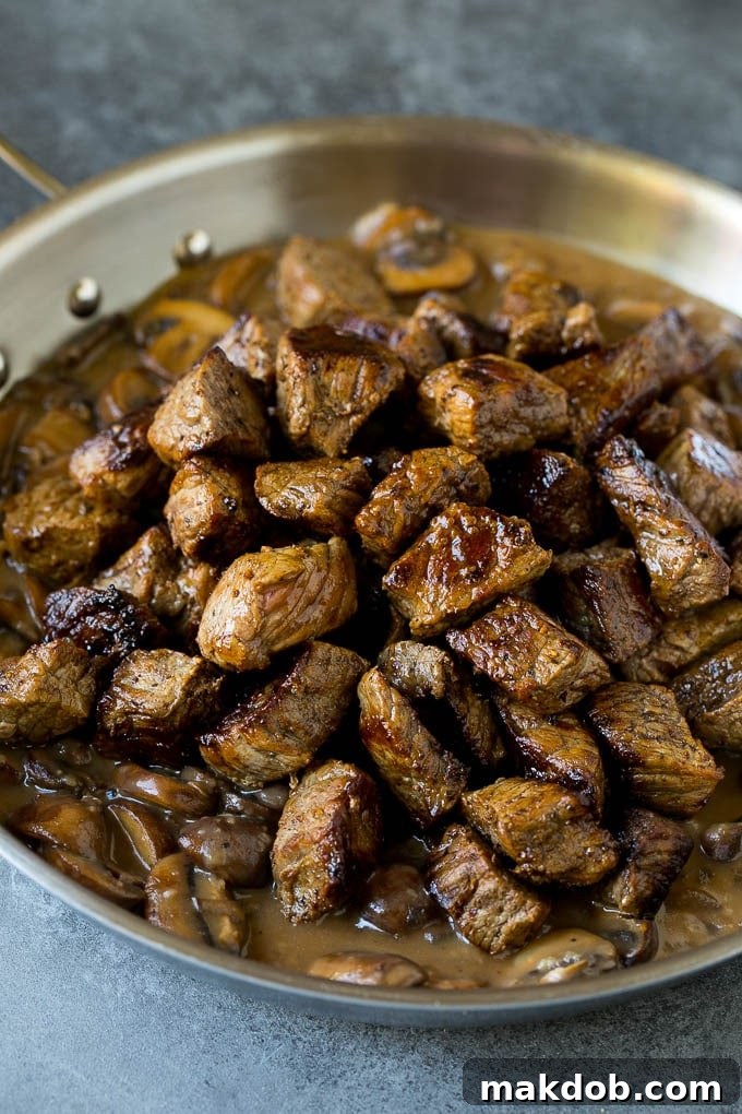 Steak bites in a pool of gravy.