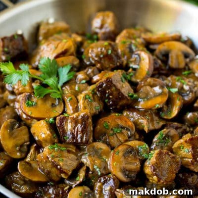 Beef tips with mushrooms in brown gravy.