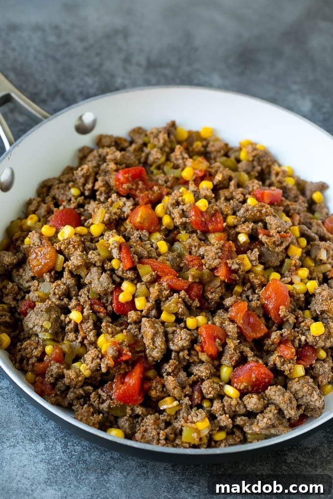Mexican Lasagna Recipe | Mexican Casserole #mexican #lasagna #groundbeef #beans #dinner #cheese #dinneratthezoo Ground beef cooked with tomatoes, green chilies and corn.