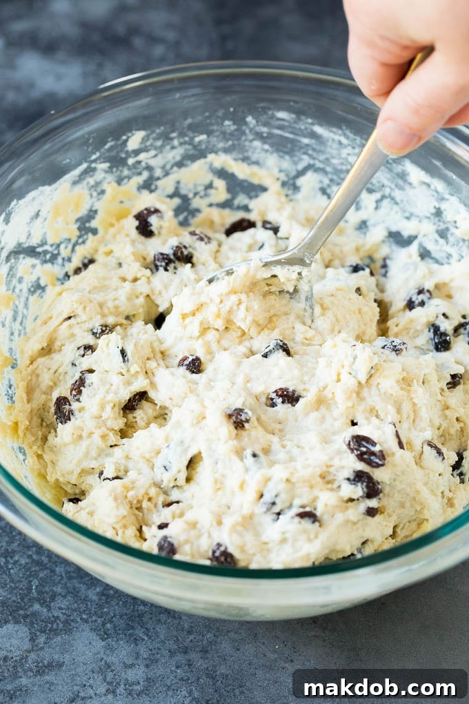 Irish Soda Bread Recipe #bread #baking #stpatricksday #sidedish #dinneratthezoo Buttermilk bread dough shaped into a ball in a mixing bowl.