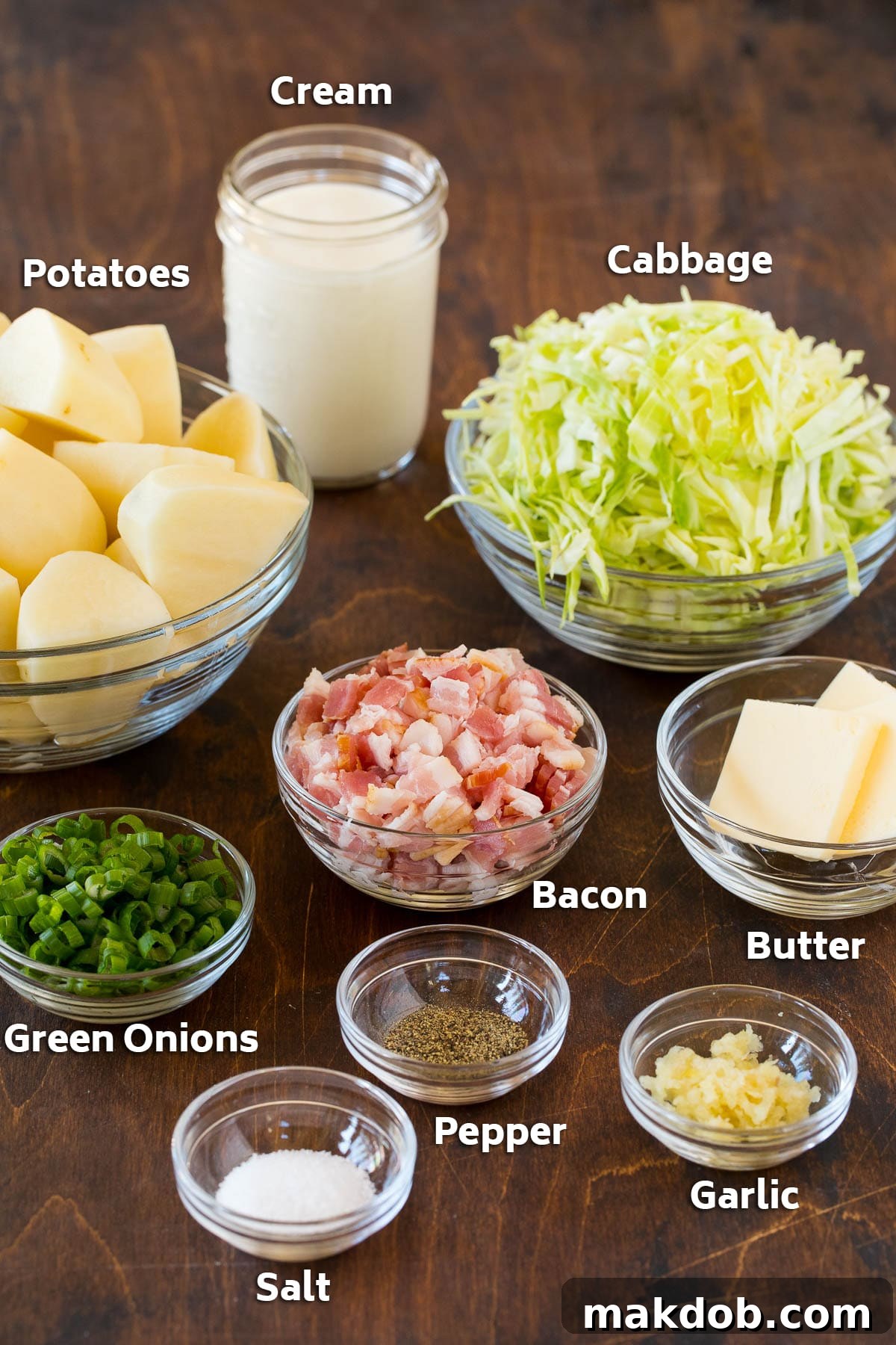 Colcannon Recipe | Mashed Potatoes #potatoes #cabbage #bacon #sidedish #stpatricksday #dinner #dinneratthezoo Bowls of bacon, cabbage, potatoes, and seasonings.
