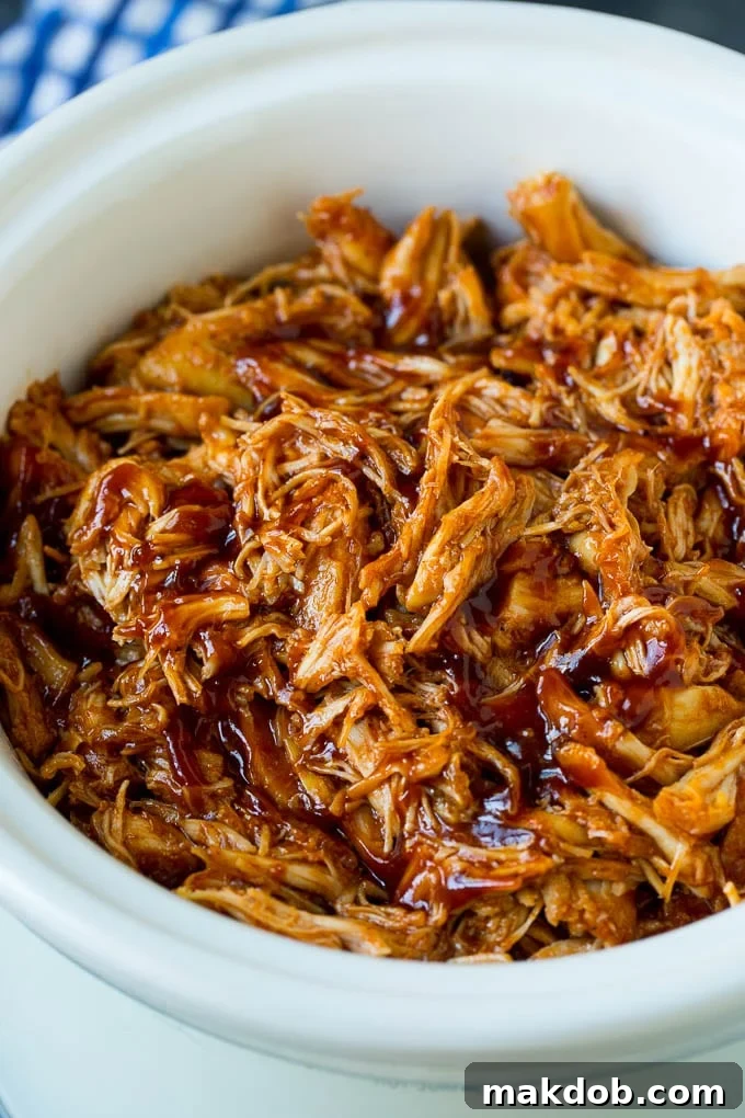 Crockpot BBQ Chicken Recipe | Barbecue Chicken #chicken #bbq #slowcooker #crockpot #dinner #dinneratthezoo Shredded crockpot BBQ chicken, ready to be served, still warm in the slow cooker.