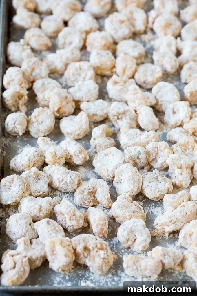 Shrimp coated in egg and flour.