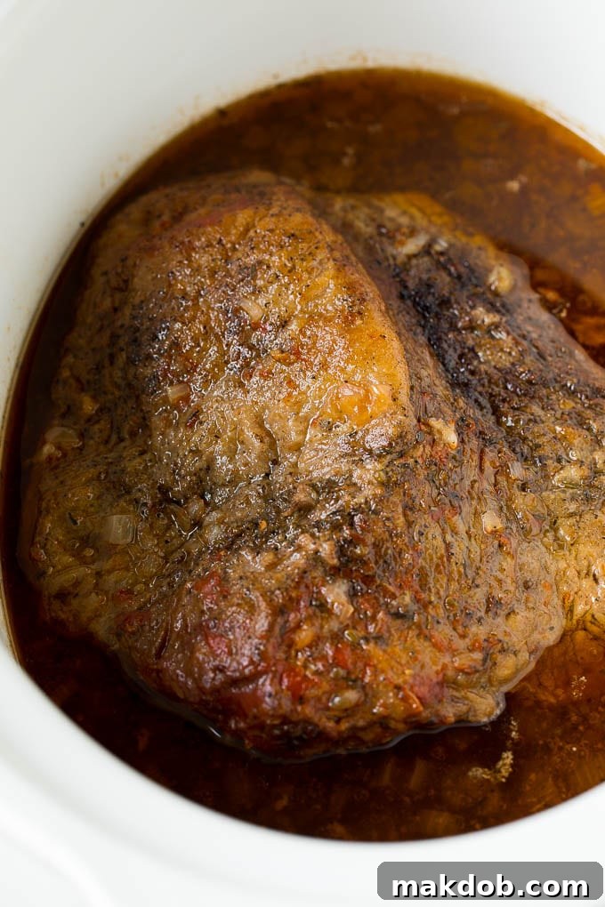 Slow cooked brisket in a crock pot.
