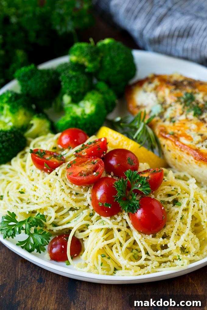 Garlic and Herb Angel Hair Pasta #pasta #garlic #sidedish #dinner #dinneratthezoo Angel hair pasta served with chicken and broccoli.