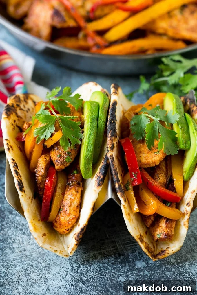 Chicken Fajita Marinade Recipe | Chicken Fajitas #chicken #fajitas #marinade #dinner #dinneratthezoo Fajitas made with chicken fajita marinade in flour tortillas, served with toppings.