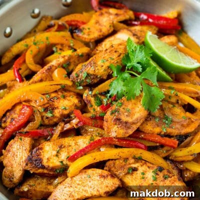 Fiesta Fajita Chicken Marinade 2 Chicken fajita marinade served over sliced chicken and vegetables.