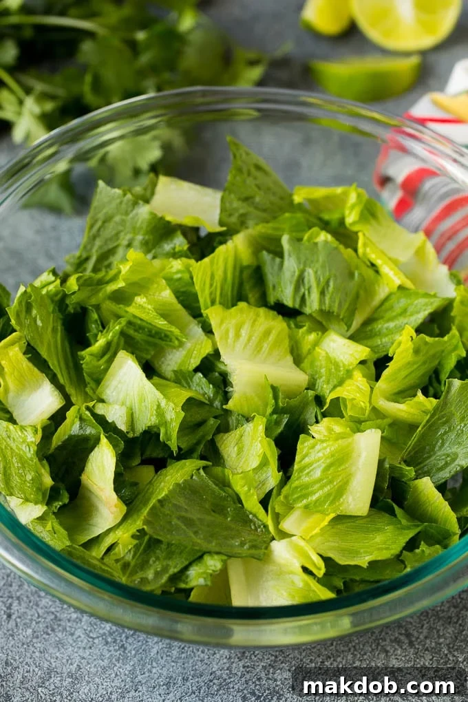 Chopped romaine lettuce in a bowl.