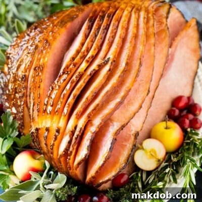 How to cook a ham results of a glazed ham garnished with fruit.