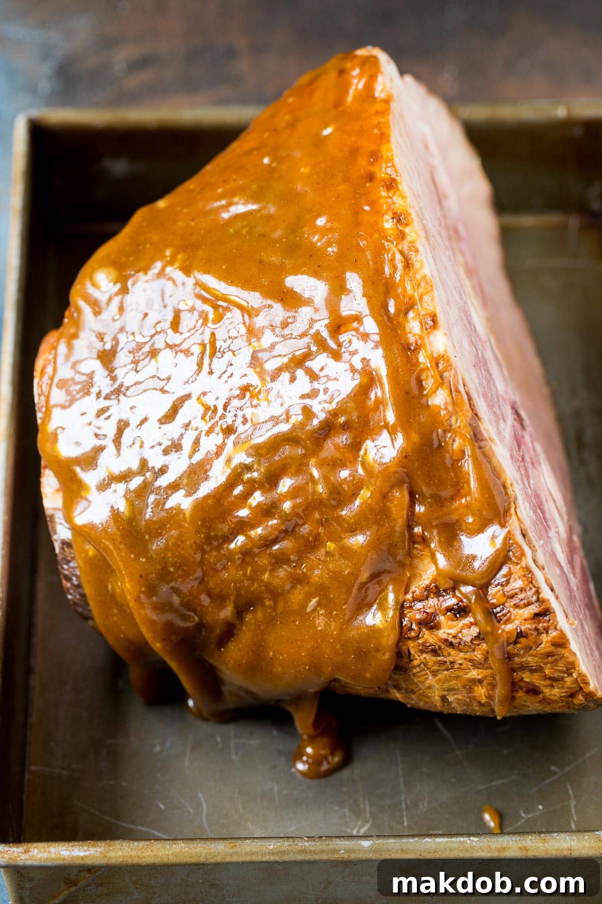 The Secret to a Succulent Ham 5 A ham coated in homemade glaze.