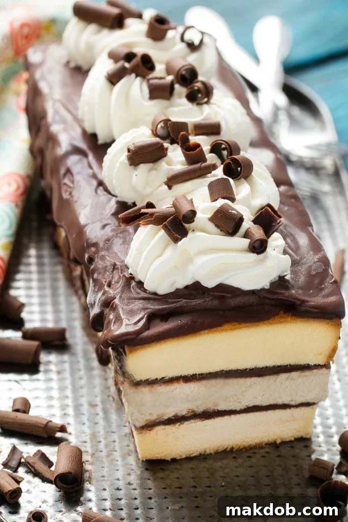 Layered Tiramisu Ice Cream Cake with coffee ice cream, pound cake, and chocolate ganache, ready for freezing. #FrozenDessert #EasyRecipe #ChocolateGanache