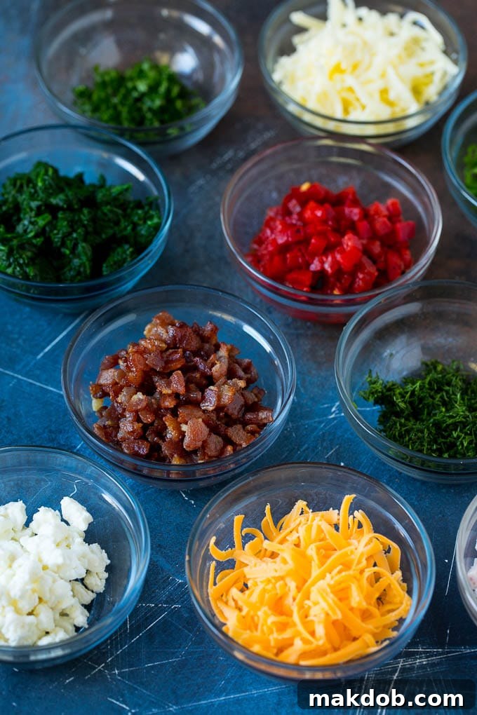Mini Quiche Recipe #eggs #breakfast #brunch #appetizer #dinneratthezoo Several bowls filled with various quiche flavorings including chopped vegetables, diced meats, and shredded cheeses.