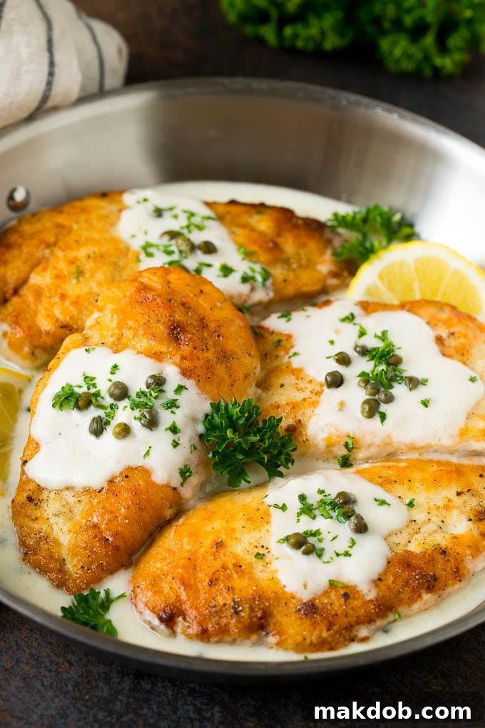 Chicken Scallopini Recipe #chicken #chickenbreast #dinner #dinneratthezoo Chicken scallopini topped with a lemon cream sauce.