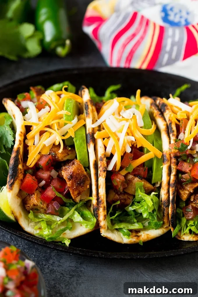 Homemade taco seasoning with a savory mix of spices, this blend can be used in all different types of Mexican food. Taco seasoning used on chicken tacos, showing the delicious results of this versatile blend.