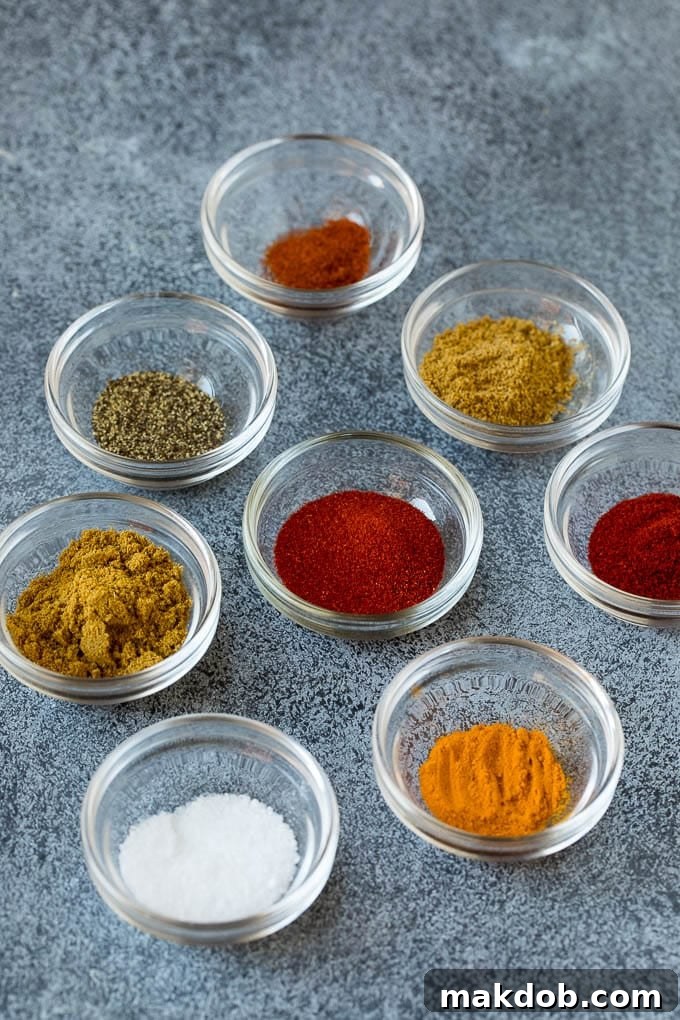 Assorted spices in small bowls.