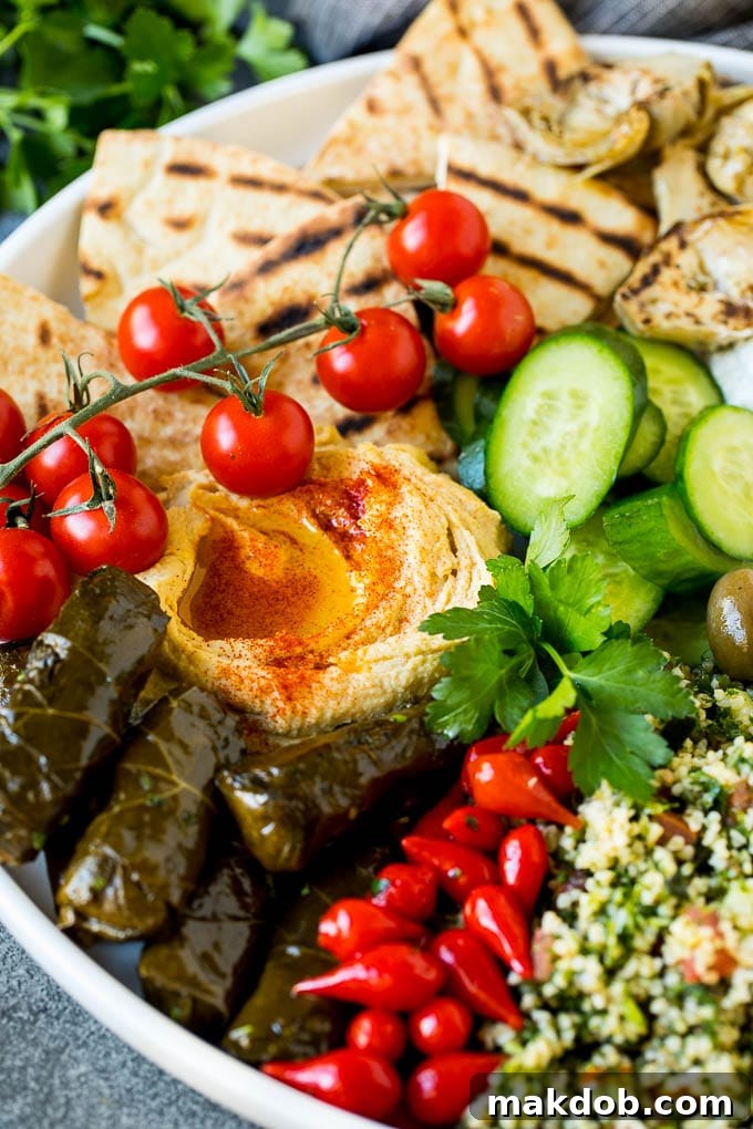 An Odyssey of Mediterranean Flavors 6 A Mediterranean mezze platter with hummus, dolmas and vegetables.