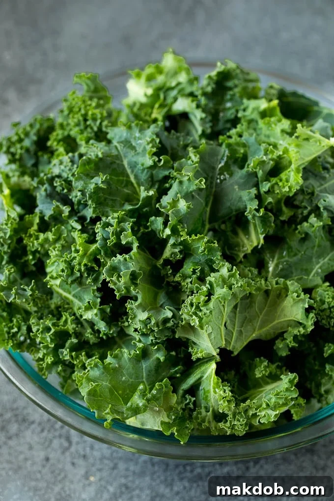 A bowl of freshly chopped kale, ready for cooking.